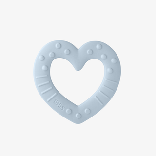 Heart-shaped blue teething ring on a white background