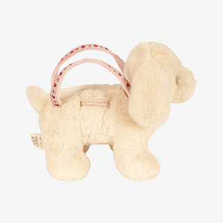 A cream-colored plush dog purse with a pink patterned strap handle, shown against a plain white background.