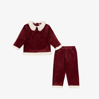 Burgundy velvet santa outfit with white trim on a white background