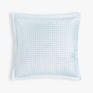 Blue and white checkered pillow on a white background