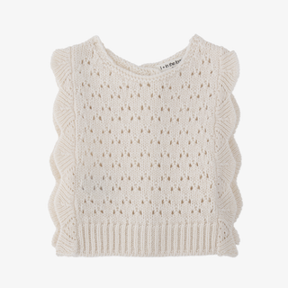 An off-white knit sleeveless baby vest with scalloped ruffle trim and a textured openwork pattern, shown flat on a light gray background.