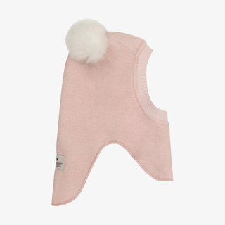 A pink child's balaclava with two fluffy pom-poms on the top, shown against a plain light gray background.