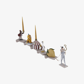 Set of figurines arranged in a train, intended to hold birthday candles in celebreations, featuring a lemon, a goose, a lion. a monkey, and a circus tent. 