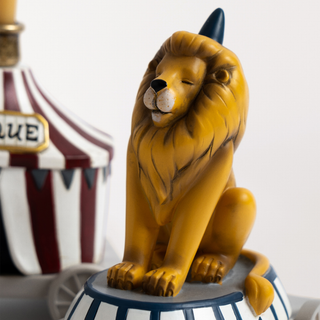 Close up shot of the lion, looking serene. 
