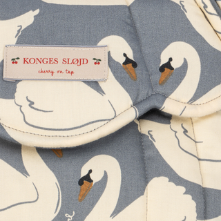 close up shot of the fabric of swan print