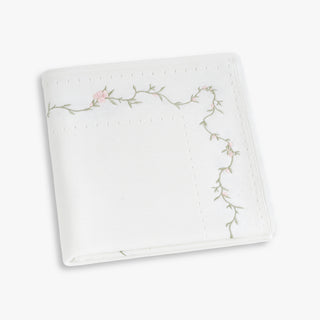 Knit Baby Blanket with Vine and Floral embroidered details. 