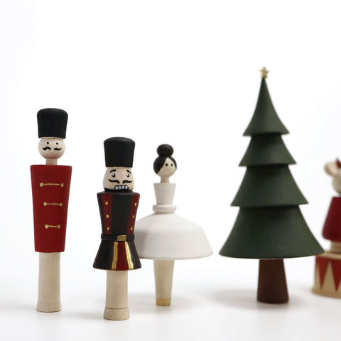 wooden soldier, nutcracker, ballerina, and tree
