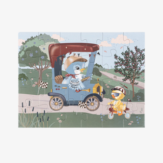 Children's puzzle with cartoon characters in a car and bicycle on a scenic background