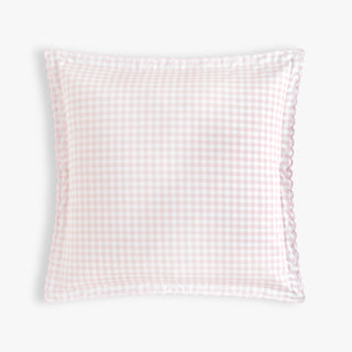 Pink and white checkered pillow on a light gray background