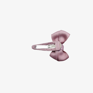 Pink striped hair clip on a white background