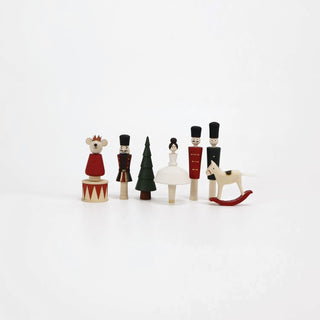 8 hand-painted figures: ballerina, nutcracker, red soldier, green soldier, mouse, rocking horse, drum, and Christmas tree.