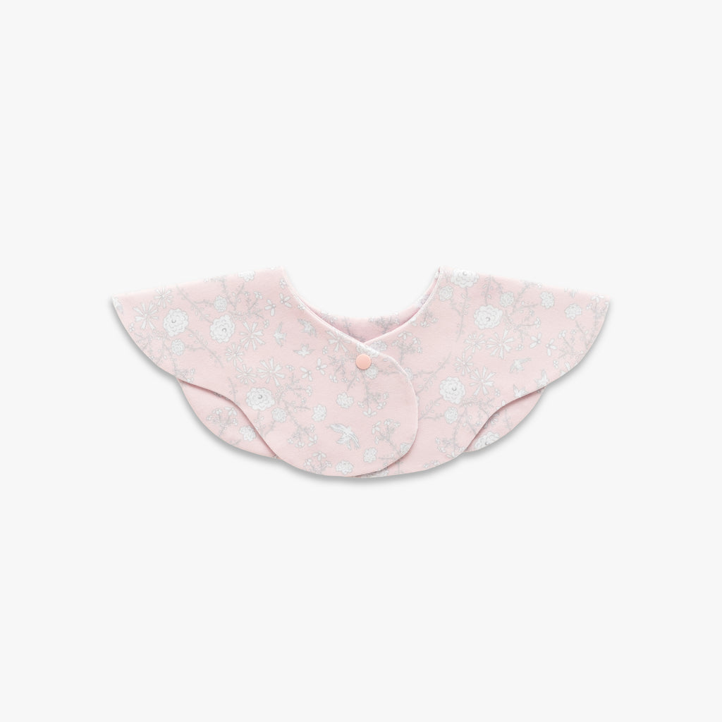 Birds Song Winglet Bib in Pink- backside with snap closure