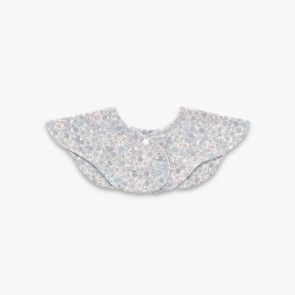 Enchanted Wildflower Winglet Bib in Ivory- Backside with snap closure