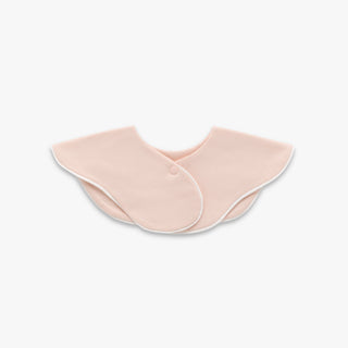 Winglet Bib in Solid Pink with White Trim- Backside with snap closure