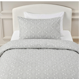 Twin duvet sheet set in the "Bird's Song" print in the color grey, the set includes a duvet cover and a standard pillowcase