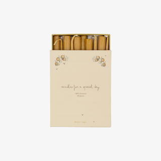 Box of candles with decorative design on a white background