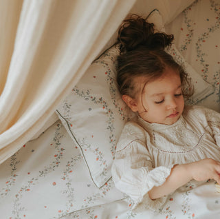 Botanical Berries Toddler Duvet with Toddler Girl laying in bed