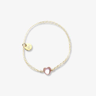 gold bracelet with pink heart