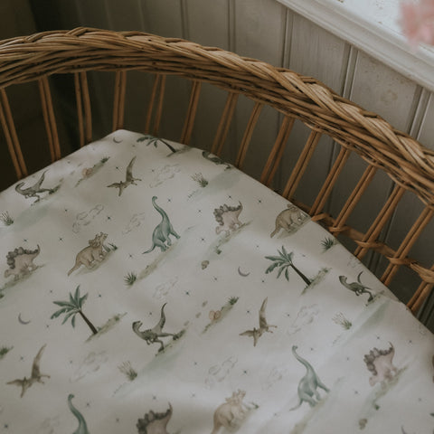 Dino Dreams Crib Sheet in Sage in bassinet