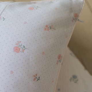Close up of toddler pillow in Ditsy Floral - Pink.