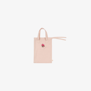 Pink tote bag with a floral design on a white background