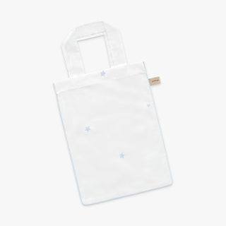 White tote bag with embroidered blue stars on a white background
