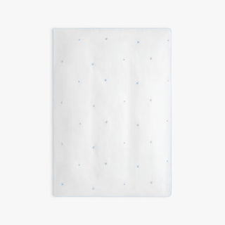 White baby duvet with blue stars embroidery on a while background
