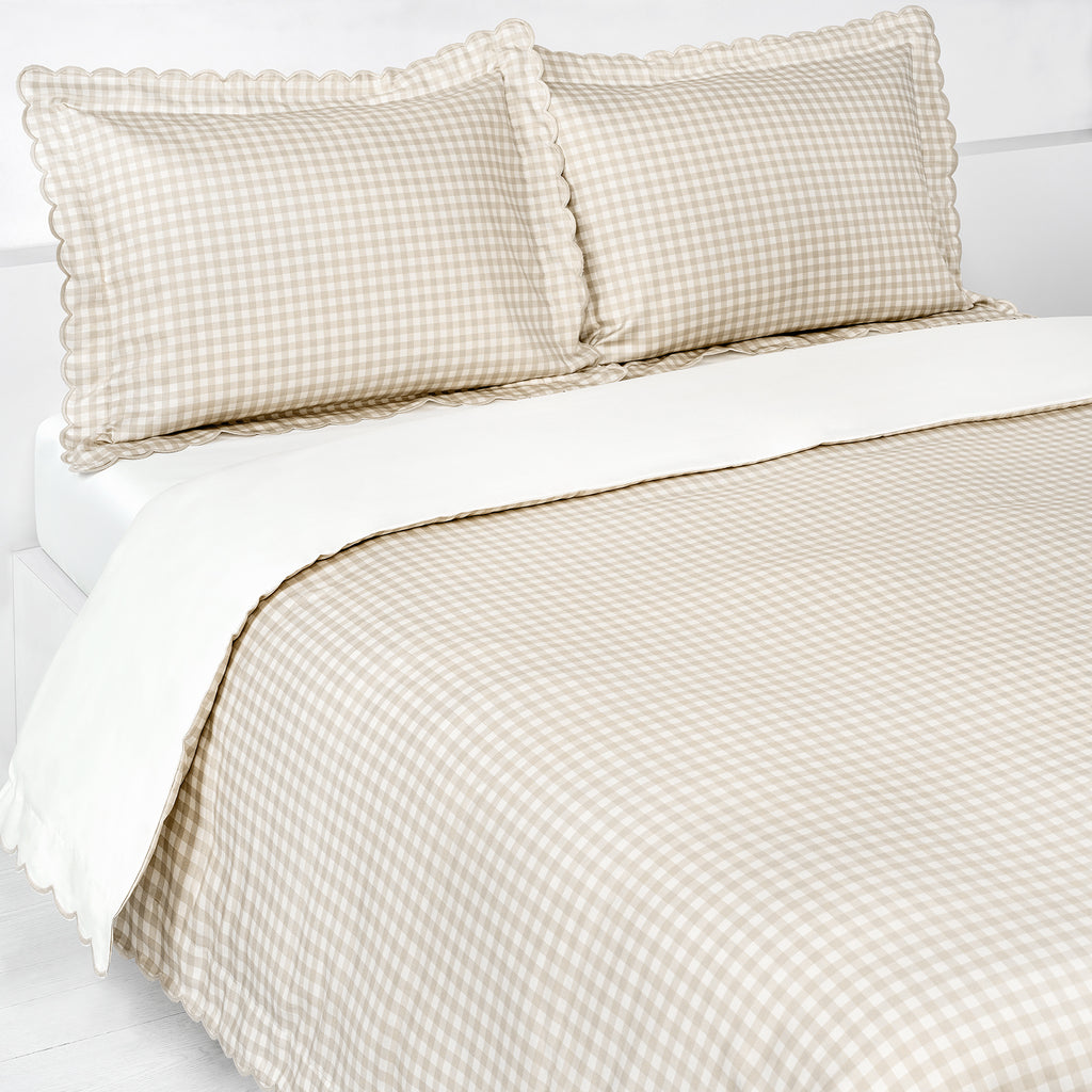 Picnic Gingham Full/Queen Duvet Cover in the Beige Print displayed on bed. Shown with two standard size pillow cases in the same print.