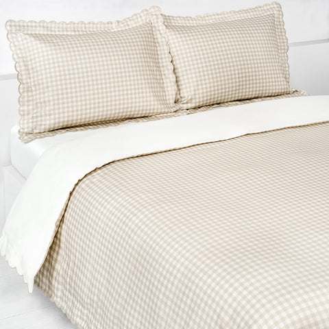 Picnic Gingham Full/Queen Duvet Cover in the Beige Print displayed on bed. Shown with two standard size pillow cases in the same print.