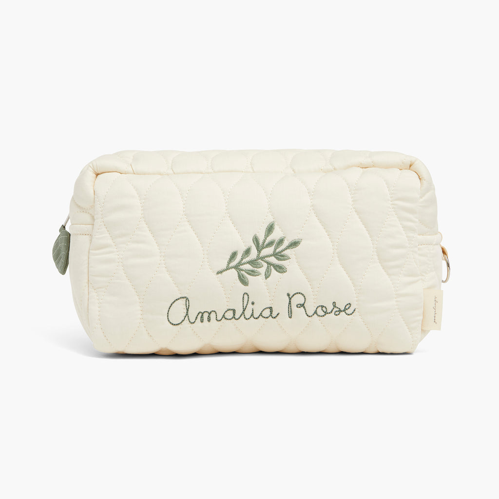Personalize Me: Quilted cream-colored pouch with 'Amelia Rose' embroidery on a white background