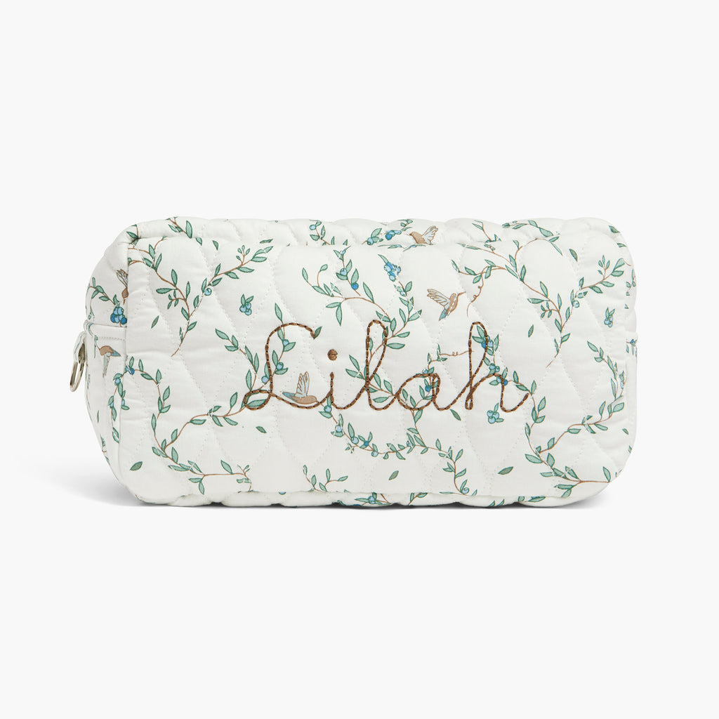 Personalize Me: Quilted pouch with floral patterns and 'Lilah' embroidery on a white background