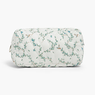 Quilted bag with floral pattern on a white background