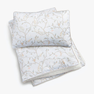 Animal Parade patterned bedding set on a white background