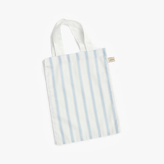Ivory tote bag with blue stripes on a white background