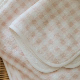 Close-up of a pink and white picnic gingham