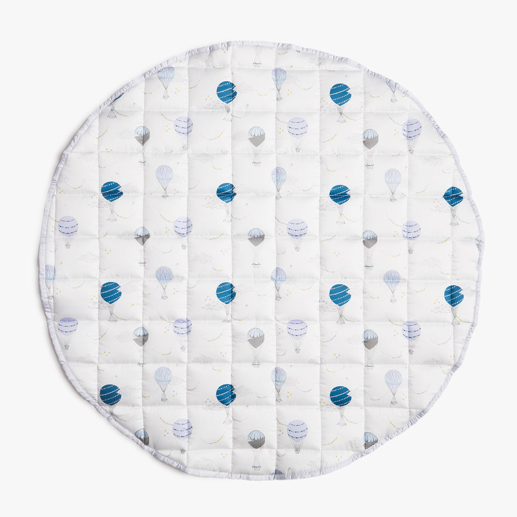 Front of play mat, Touch The Sky print in Blue.