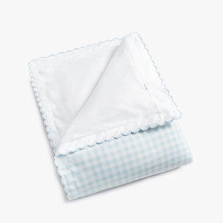 folded blue gingham baby duvet 