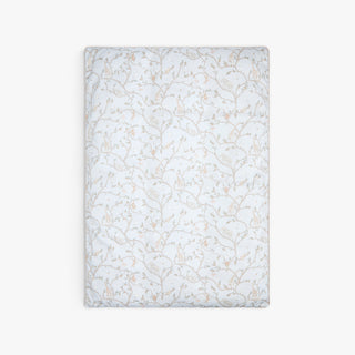 Floral patterned baby duvet in Animal Parade on a white background