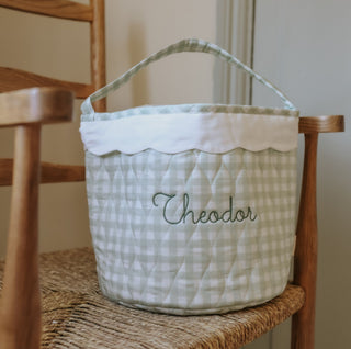 Quilted basket with 'Theodor' embroidery on a wooden chair