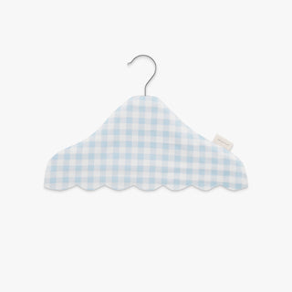 Blue and white checkered hanger on a light gray background