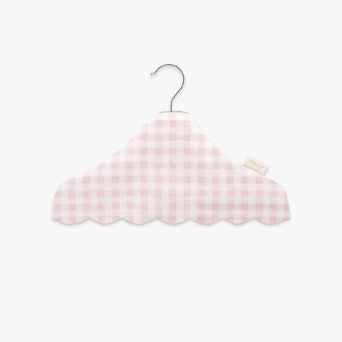 Pink gingham-patterned hanger on a white background
