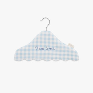 Blue and white checkered cloud-shaped hanger with 'I am loved' text on a white background