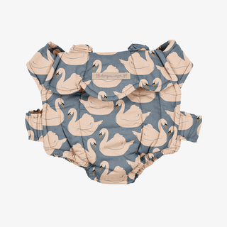 Baby doll carrier with swan pattern on a white background. 