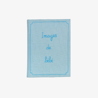 Light blue fabric book with 'Images de bebe' text on a white background