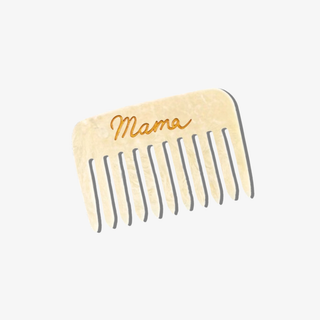 Small cream-colored comb with 'Mama' engraved on a white background