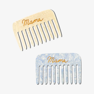 Two combs with 'Mama' engraved on them against a white background