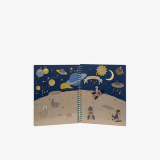 Open notebook with space-themed illustrations on a white background