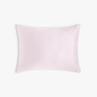 Soft Pink Solid pillow on a white background