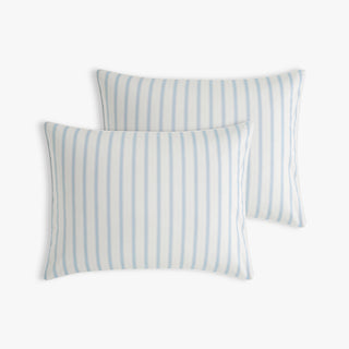 Two striped pillows on a white background