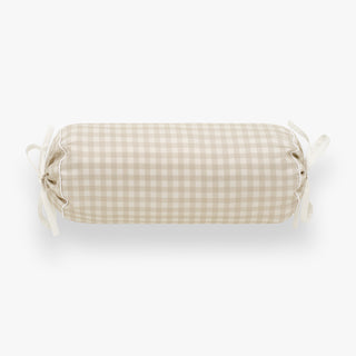Checkered cylindrical pillow on a white background